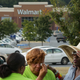 A woman who identified herself only as Tonya C. and says she was fired from Wal-Mart is comforted by friends during a demonstration outside a store, Sept. 5, 2013, in Hyattsville, Md.
Chip Somodevilla/Getty Images
